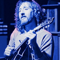 In the studio about 1981. I'm not sure whose mandolin I'm holding. I really didn't know much on the mandolin back then.
