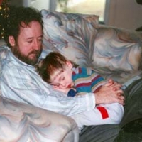 My son Ian and me resting our eyes.