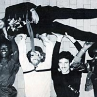 Spatz (the musical wonderdog) funk band. The girl we are holding up is Terry Thomasson, great singer and the granddaughter of fiddling great Benny Thomasson. I’m the one in the hat.