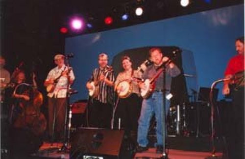 Alan Munde, Missy Raines, Wayne Shrubsall, Tony Trischka, Bill Evans, me, and Steve Smith. Wayne is the one in the hats…