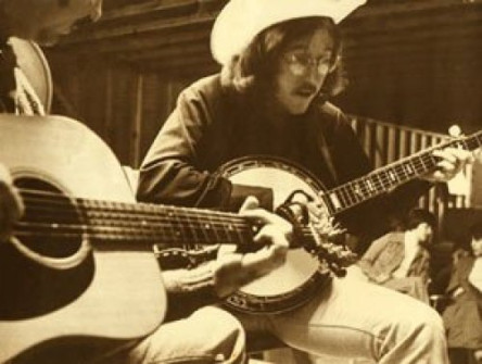 Picking with Bob Davis of the Stone Mountain Boys in 1972 in a hanger. I’m the one in the hat…
