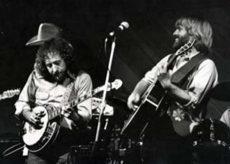 Playing with Michael Murphy in 1982. The hat belongs to the bass player behind me.