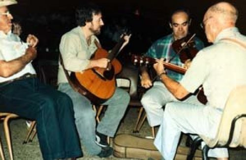 With Texas Shorty at the Athens Texas, fiddle contest, around 1993. That’s a 1937 000-18 I let get away… Dang… I think that’s Henry Kissinger in the hat…