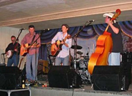 Gruene Hall with Anytown. Bach still has the hat he found at the Loretta Lynn gig in Austin.