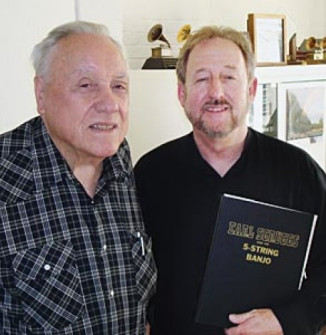With Earl Scruggs at his house (Thanks Jack Hatfield!) where I got Earl to sign my first edition, hard cover Sgruggs instruction book with his name misspelled on the cover… (See closeup on right.) I was going to ask him to misspell his name the same way but chickened out! Earl was a very gracious man but that probably would have been over the top.