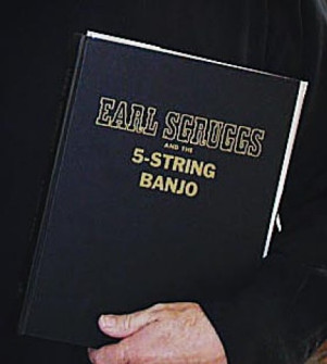 If you look closely you’ll notice that “Scruggs” is spelled “Sgruggs.” It’s that way on the dust jacket and flyleaf too. Alan Munde owns a soft cover one misspelled the same way.