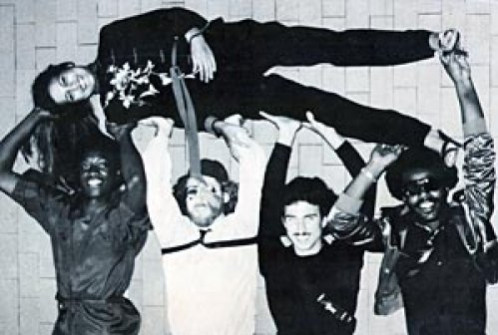 Spatz (the musical wonderdog) funk band. The girl we are holding up is Terry Thomasson, great singer and the granddaughter of fiddling great Benny Thomasson. I’m the one in the hat.