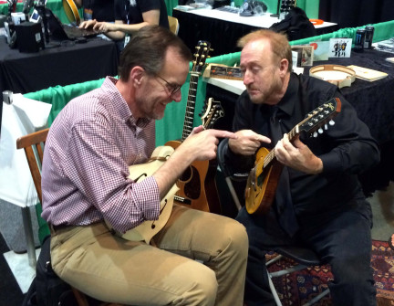 Showing Adam Steffey some hot mandolin chords. If you believe that then you're dumber than you look...